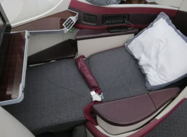 seat in a plane with a seat belt