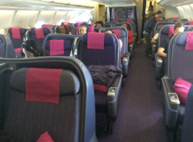 a group of people sitting on a plane