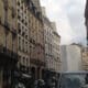 a street with cars and buildings