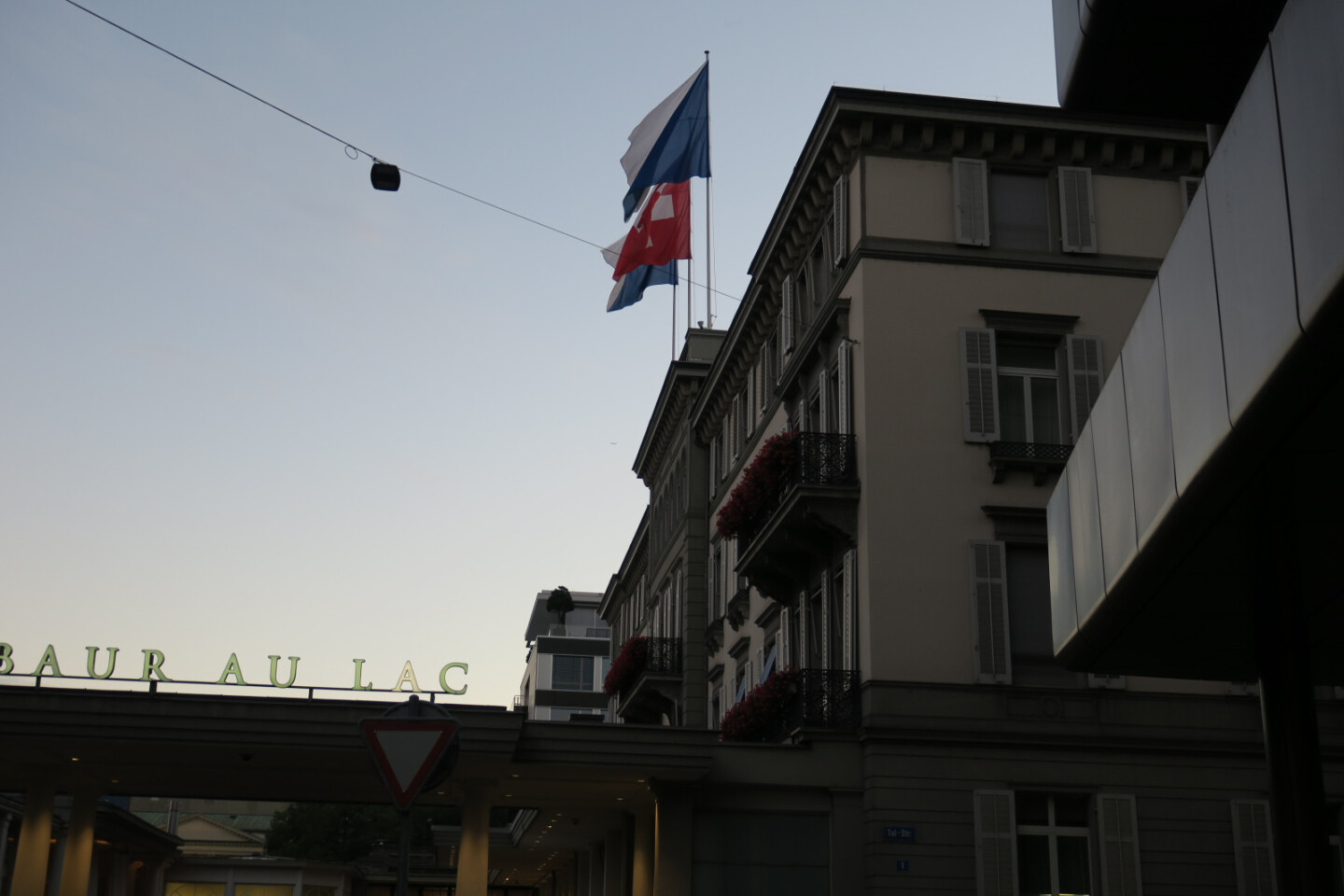 a building with flags on top