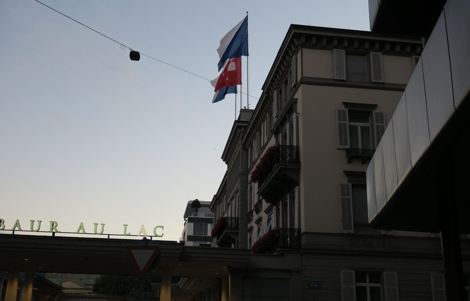 a building with flags on top