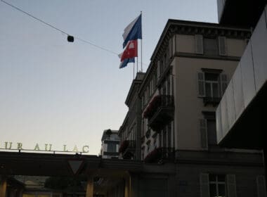a building with flags on top