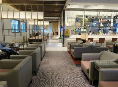 a room with chairs and tables