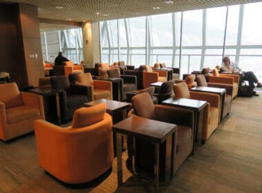 a room with chairs and tables