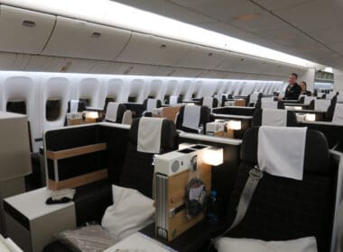 a person standing in a row of seats