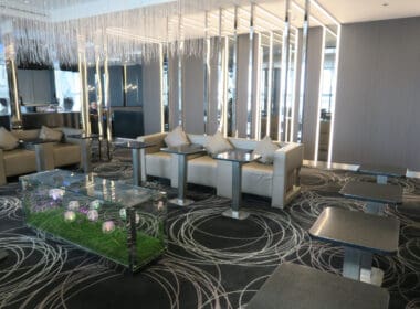 a room with a couch and tables