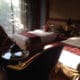 a room with two beds and a table