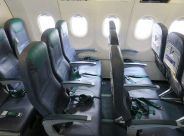 seats in an airplane with windows