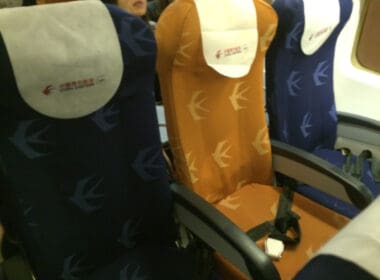 a group of people sitting in chairs