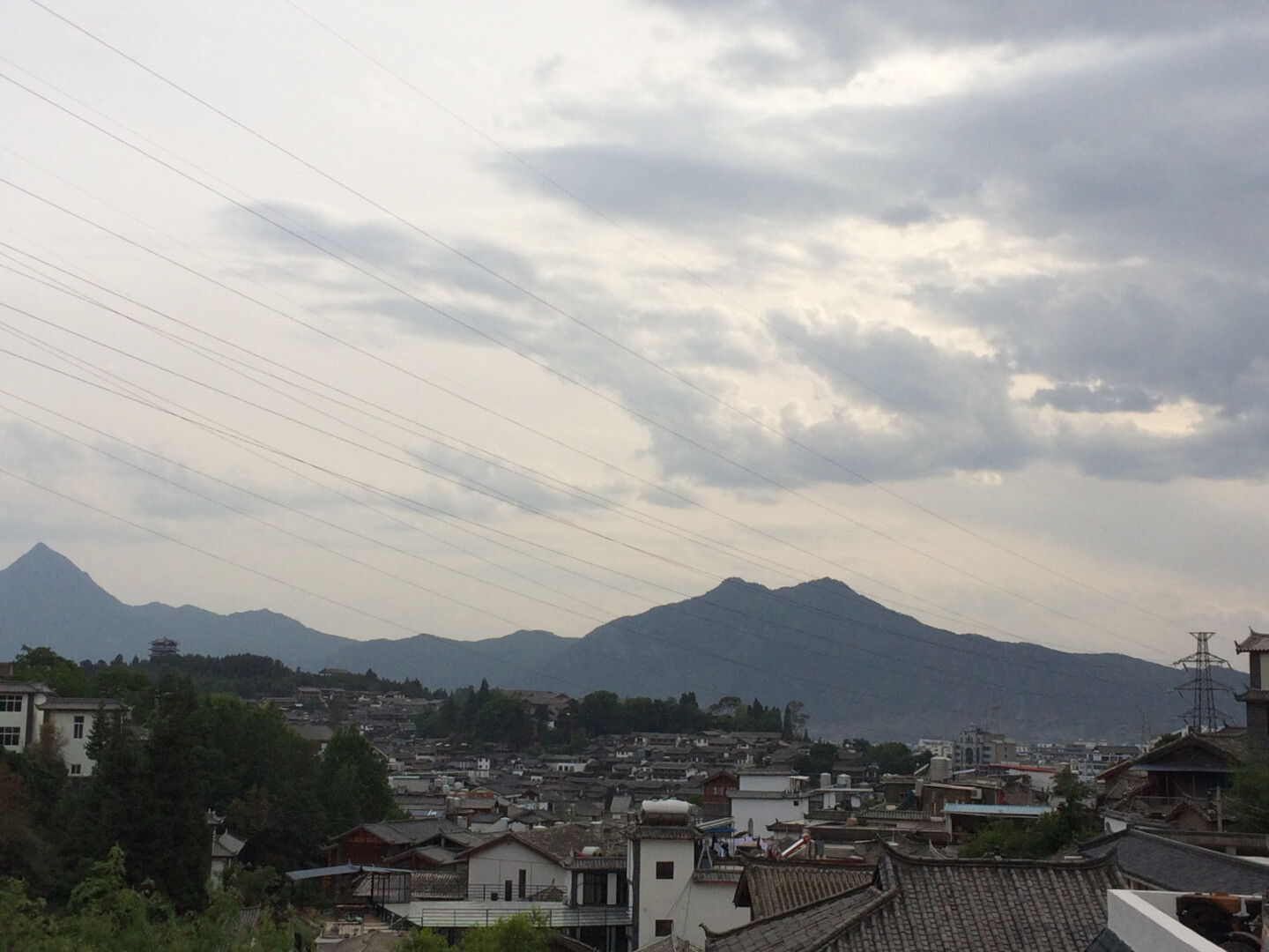 a city with mountains in the background