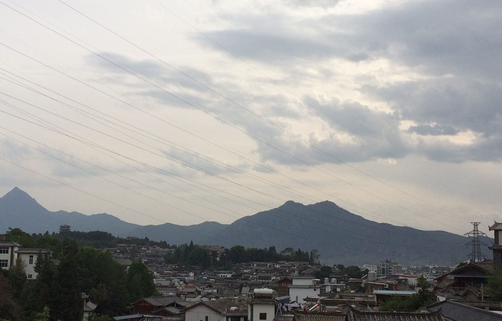 a city with mountains in the background