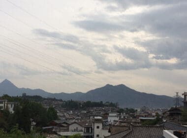 a city with mountains in the background