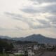 a city with mountains in the background