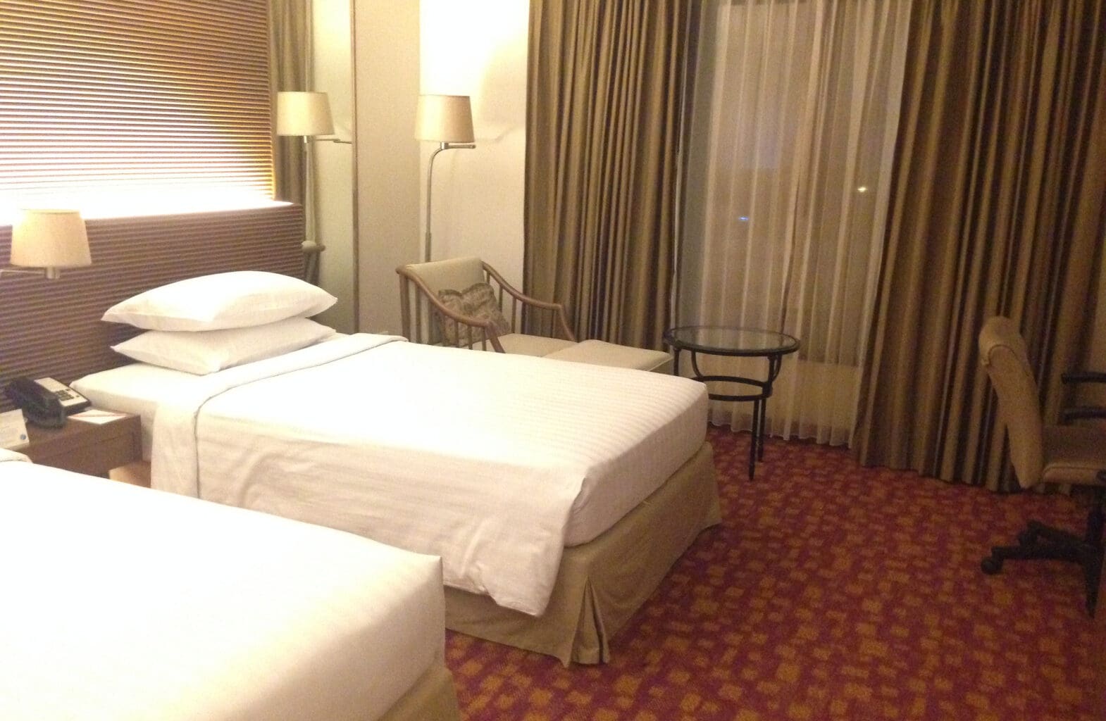 a hotel room with two beds