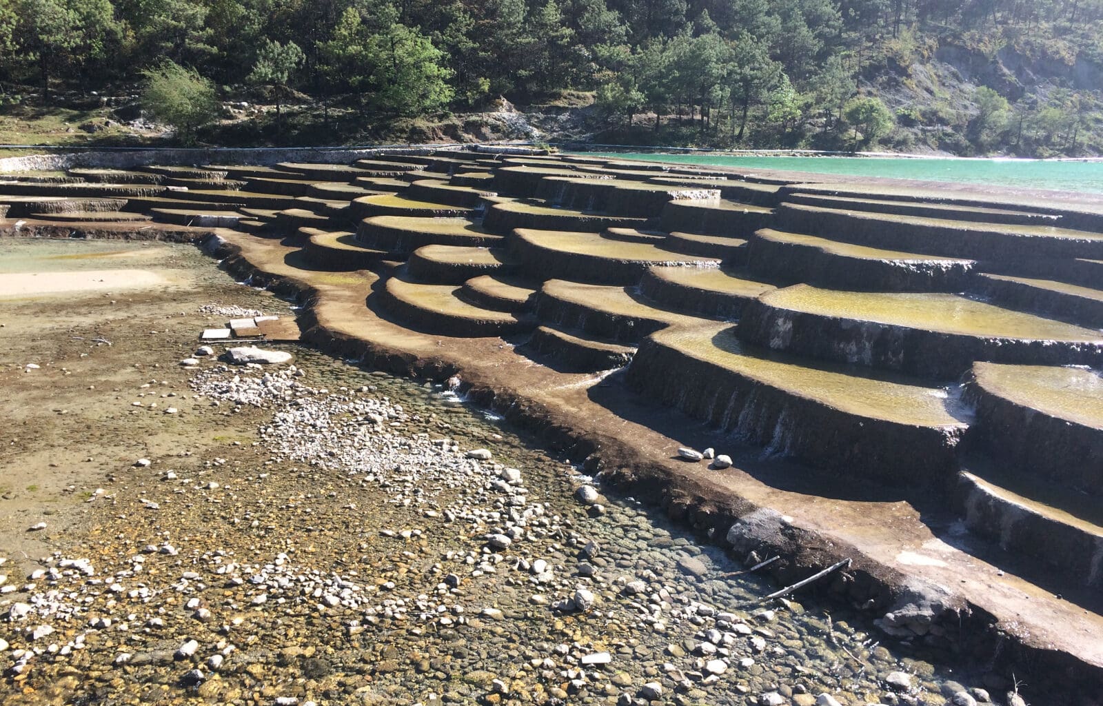 a large stone steps on a rocky beach