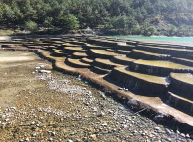 a large stone steps on a rocky beach