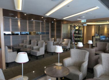 a room with chairs and tables