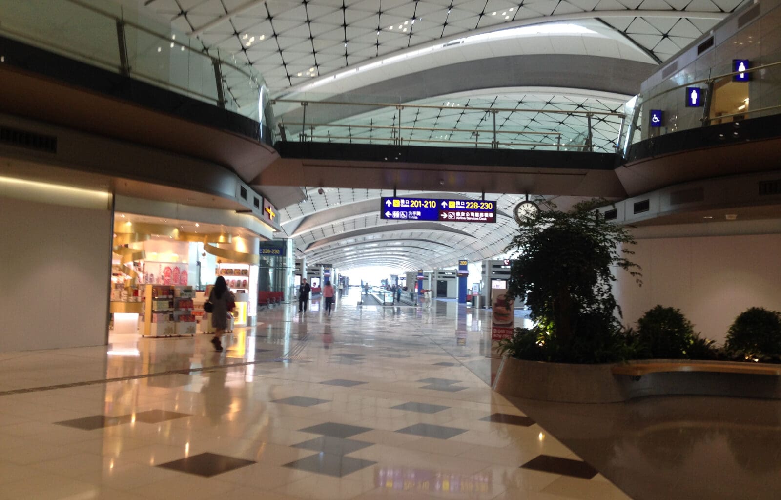 a large building with many windows and a walkway