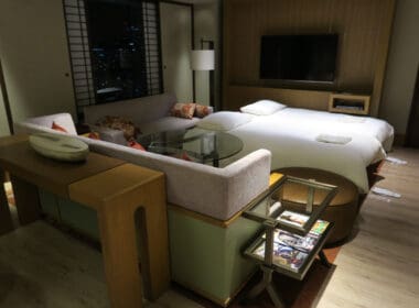 a room with a couch and a tv