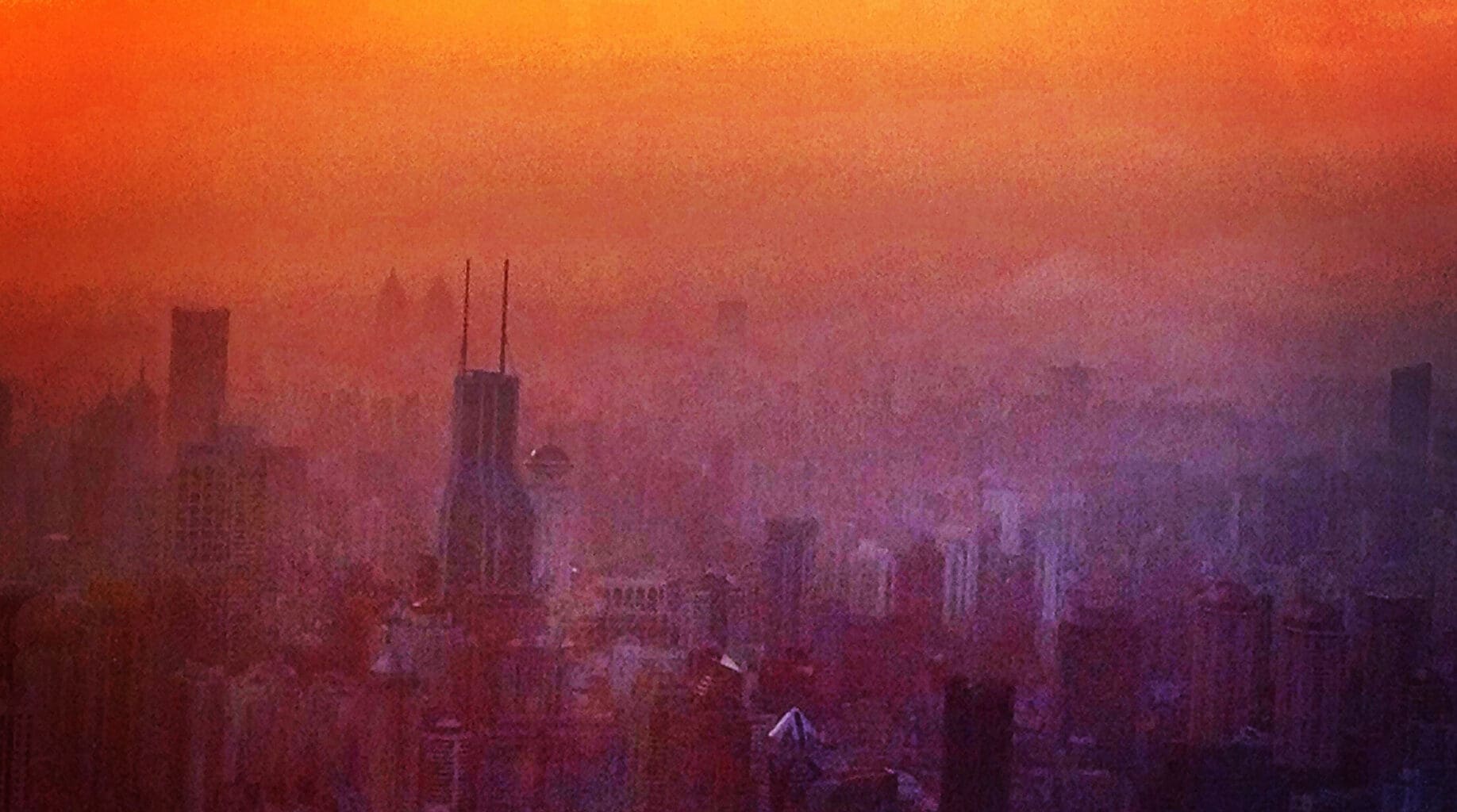 a city with a sunset