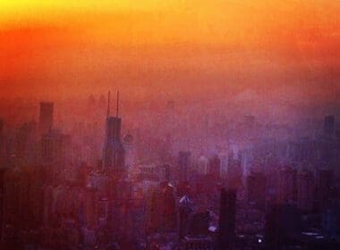 a city with a sunset