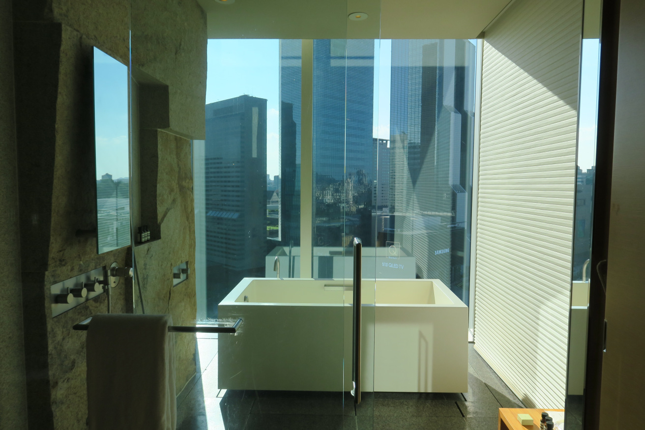 a bathroom with a large window