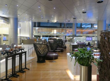 a large room with chairs and tables