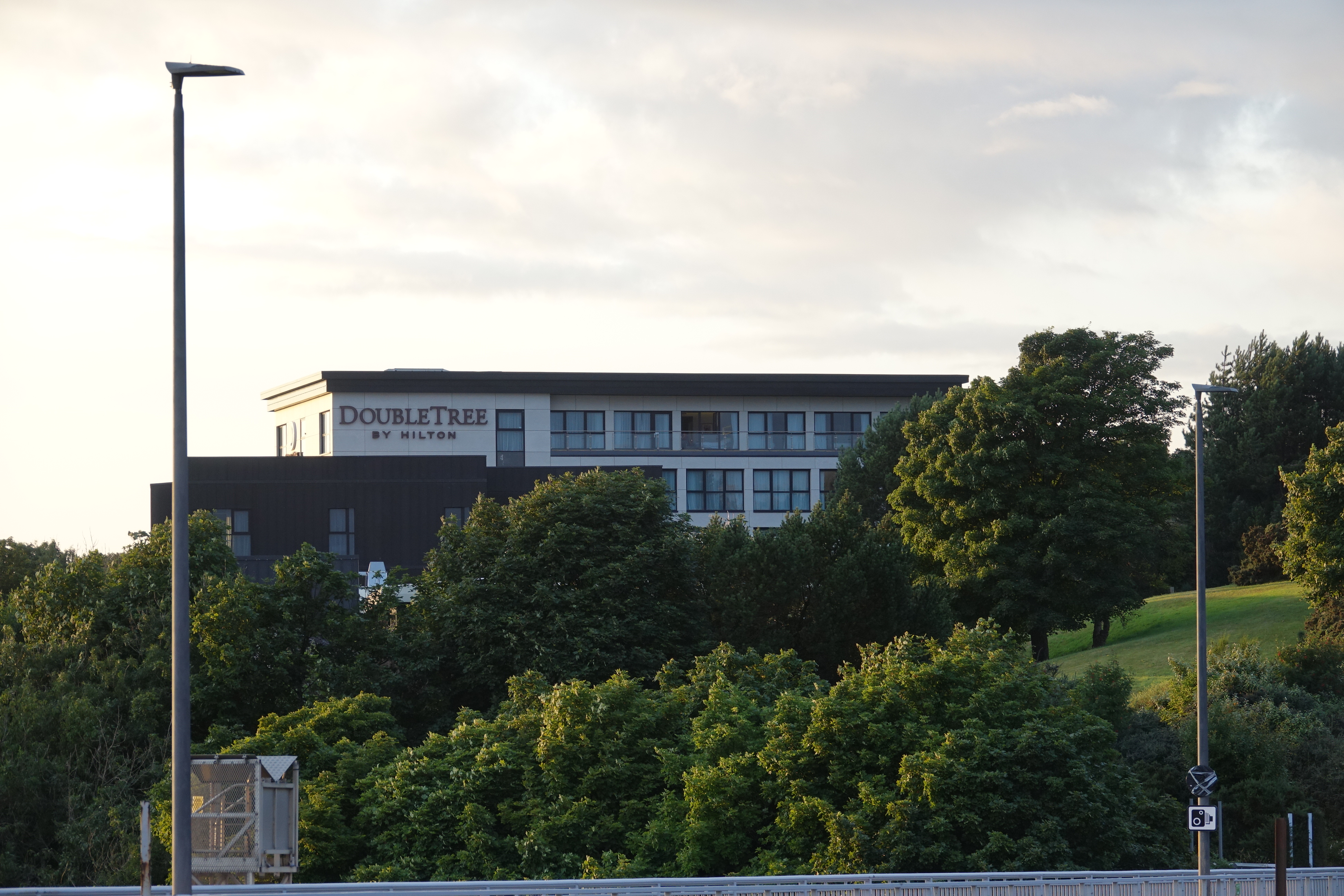 a building with trees in the background