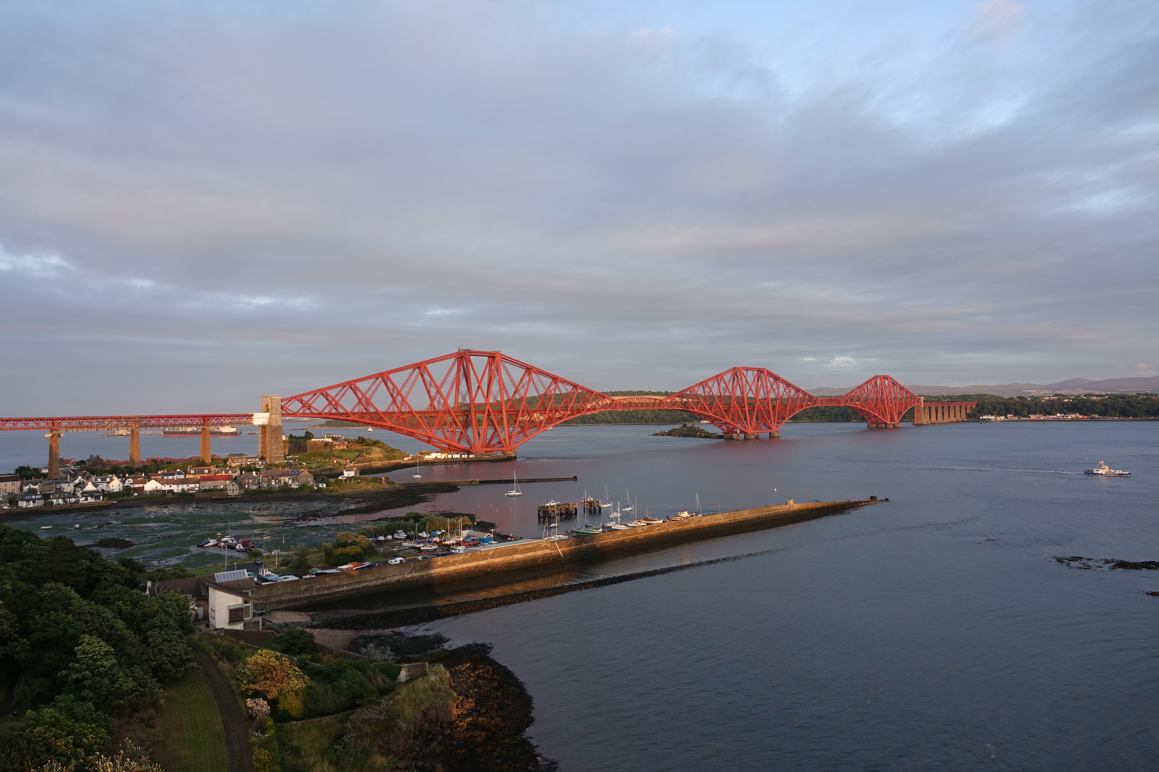 a bridge over water with a bridge and a bridge