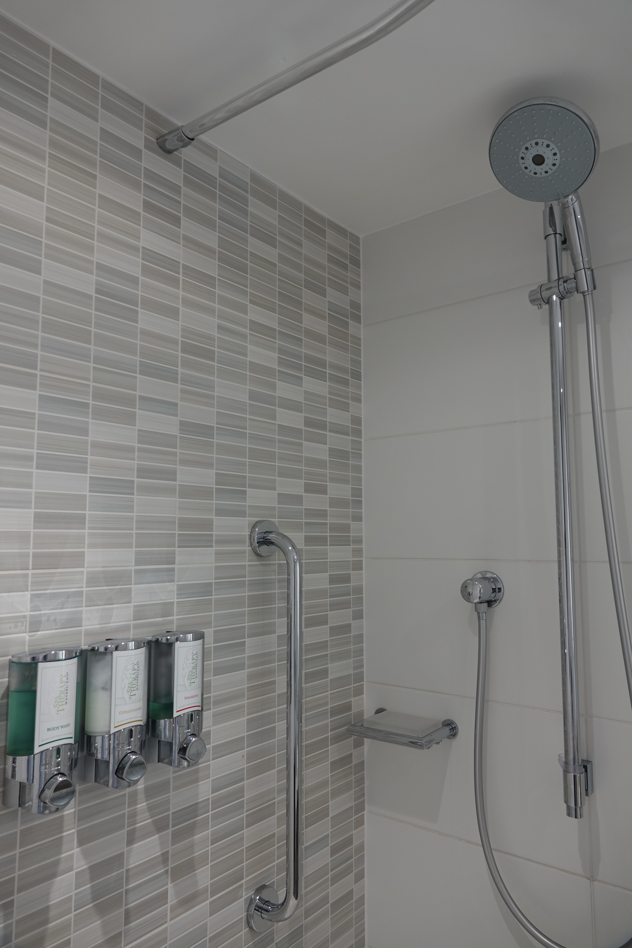 a shower with a shower head