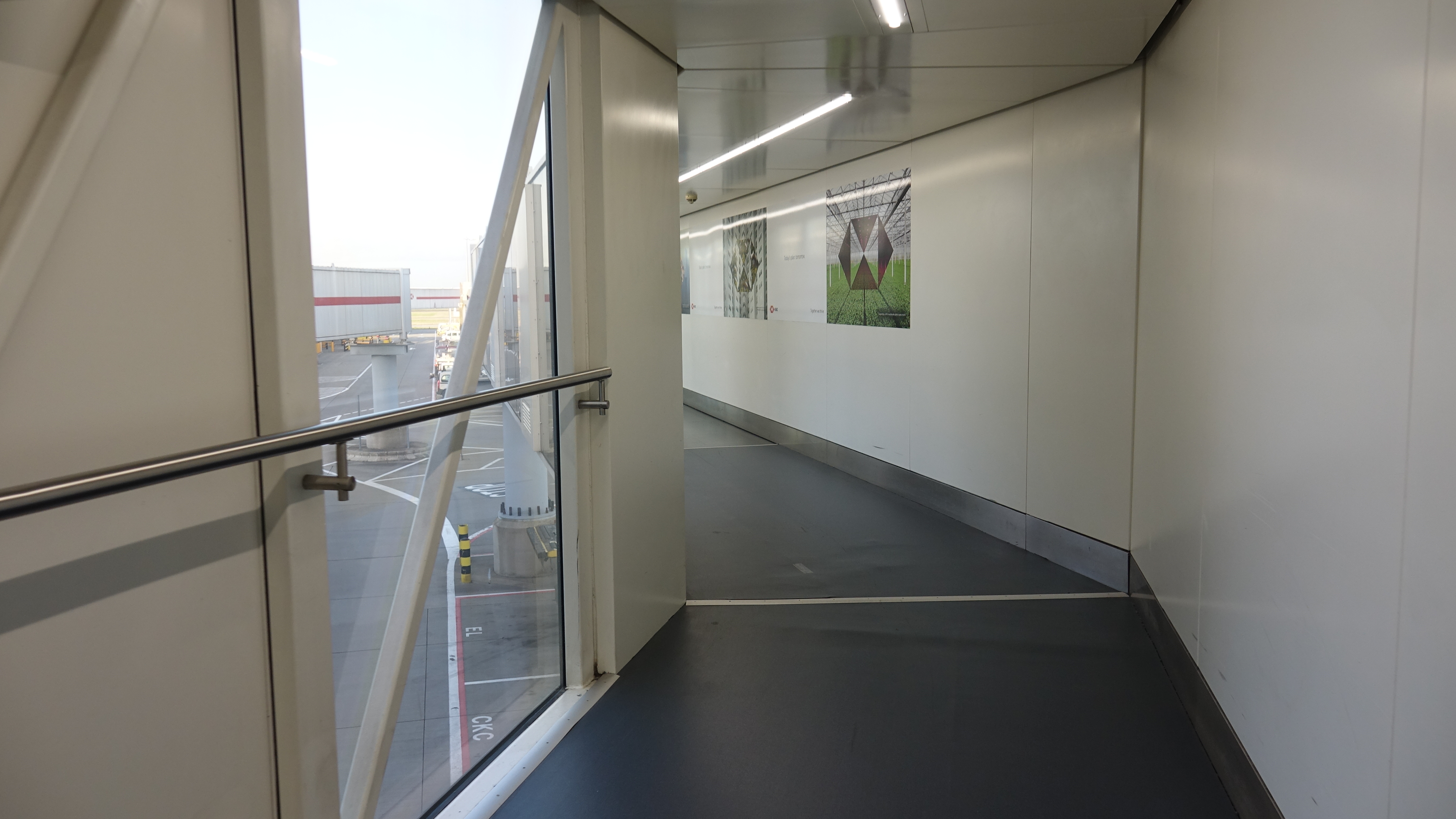 a hallway with a glass door