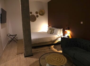 a room with a bed and a couch