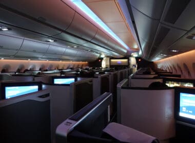 an airplane with seats and monitors