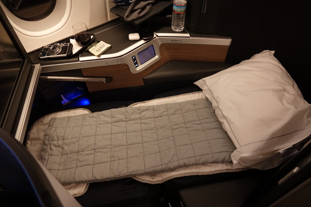 a bed in a plane