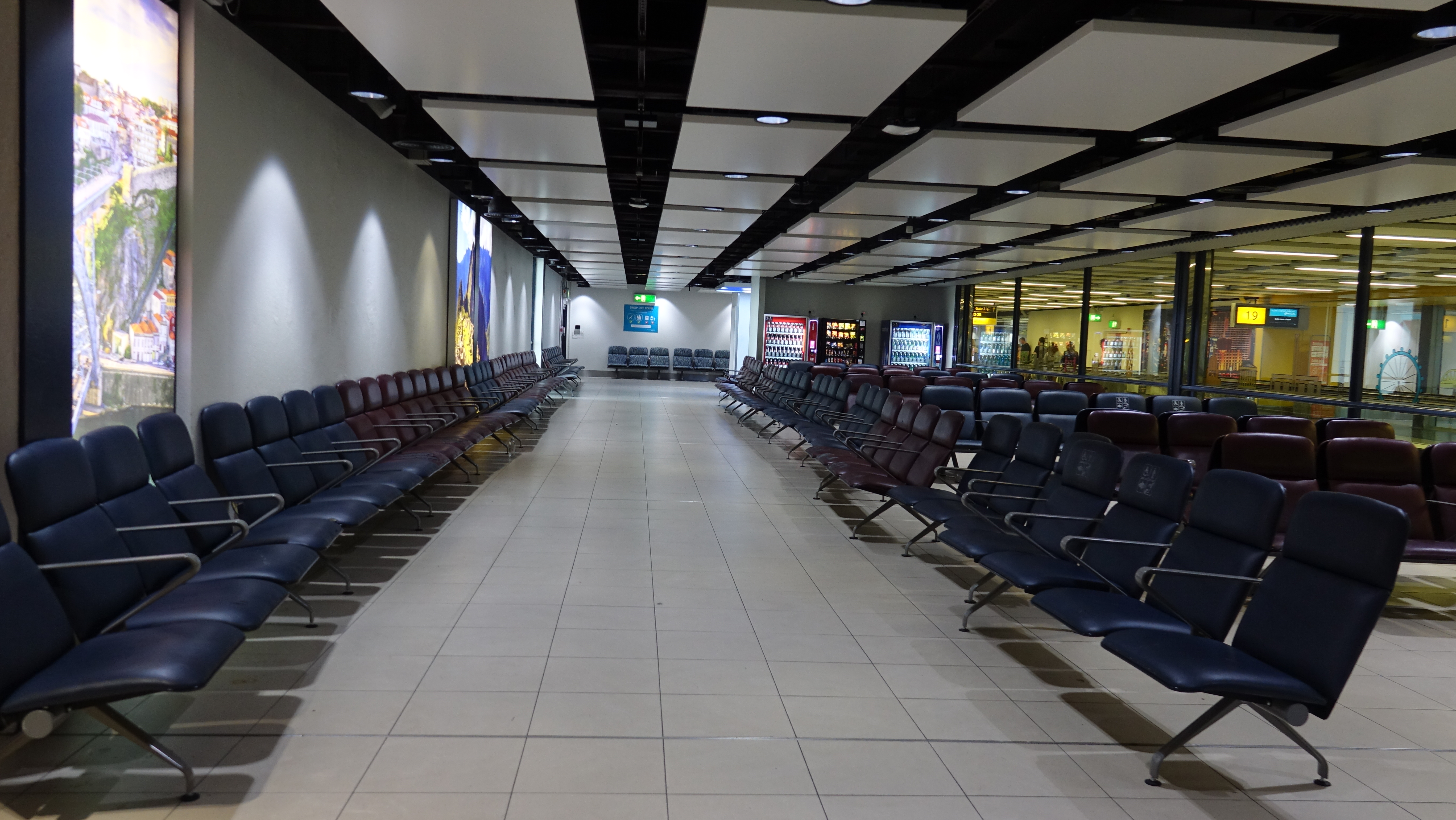 a row of chairs in a terminal