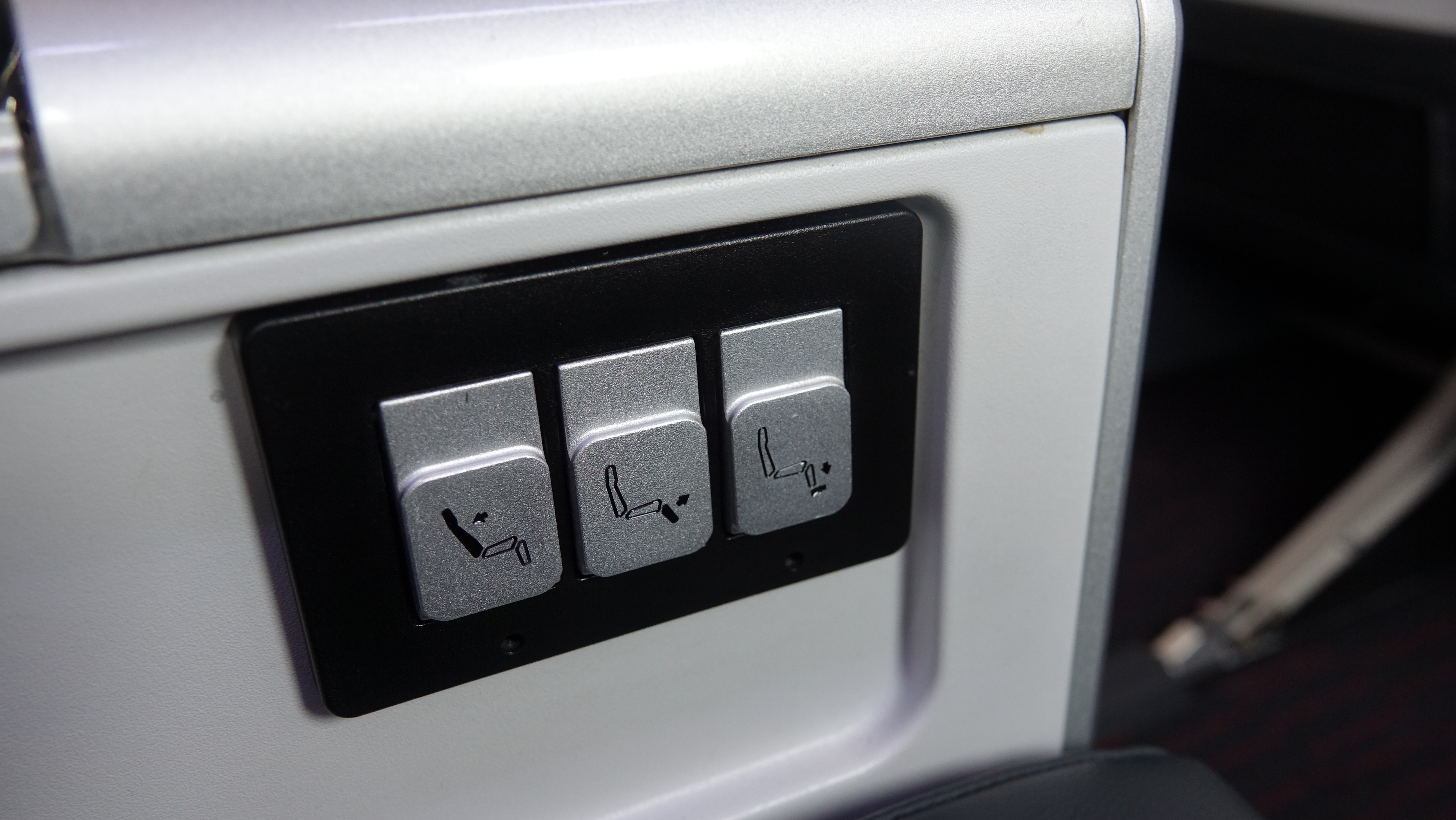 a close up of a seat buttons