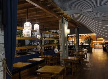 a restaurant with tables and benches