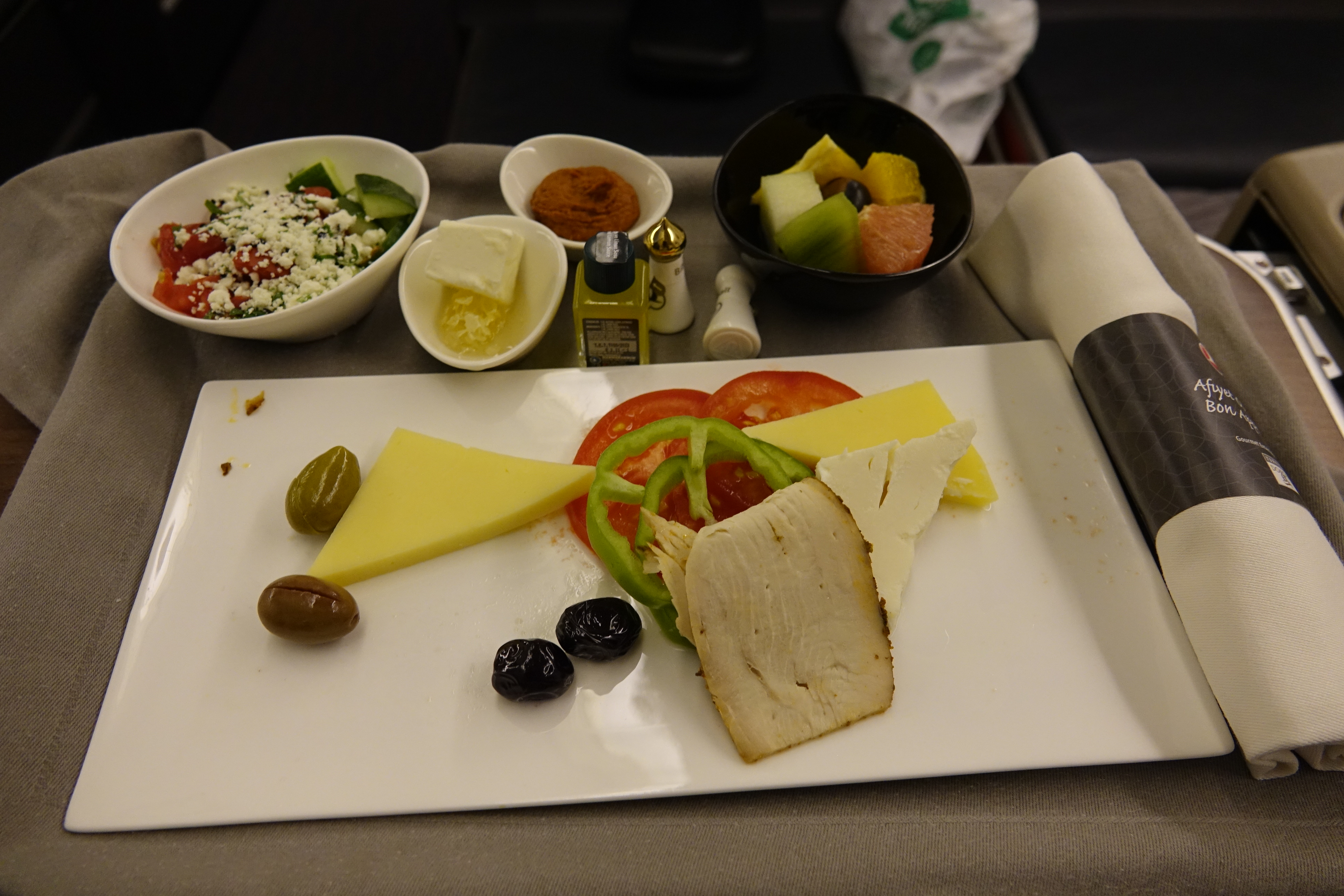 a plate of food on a tray