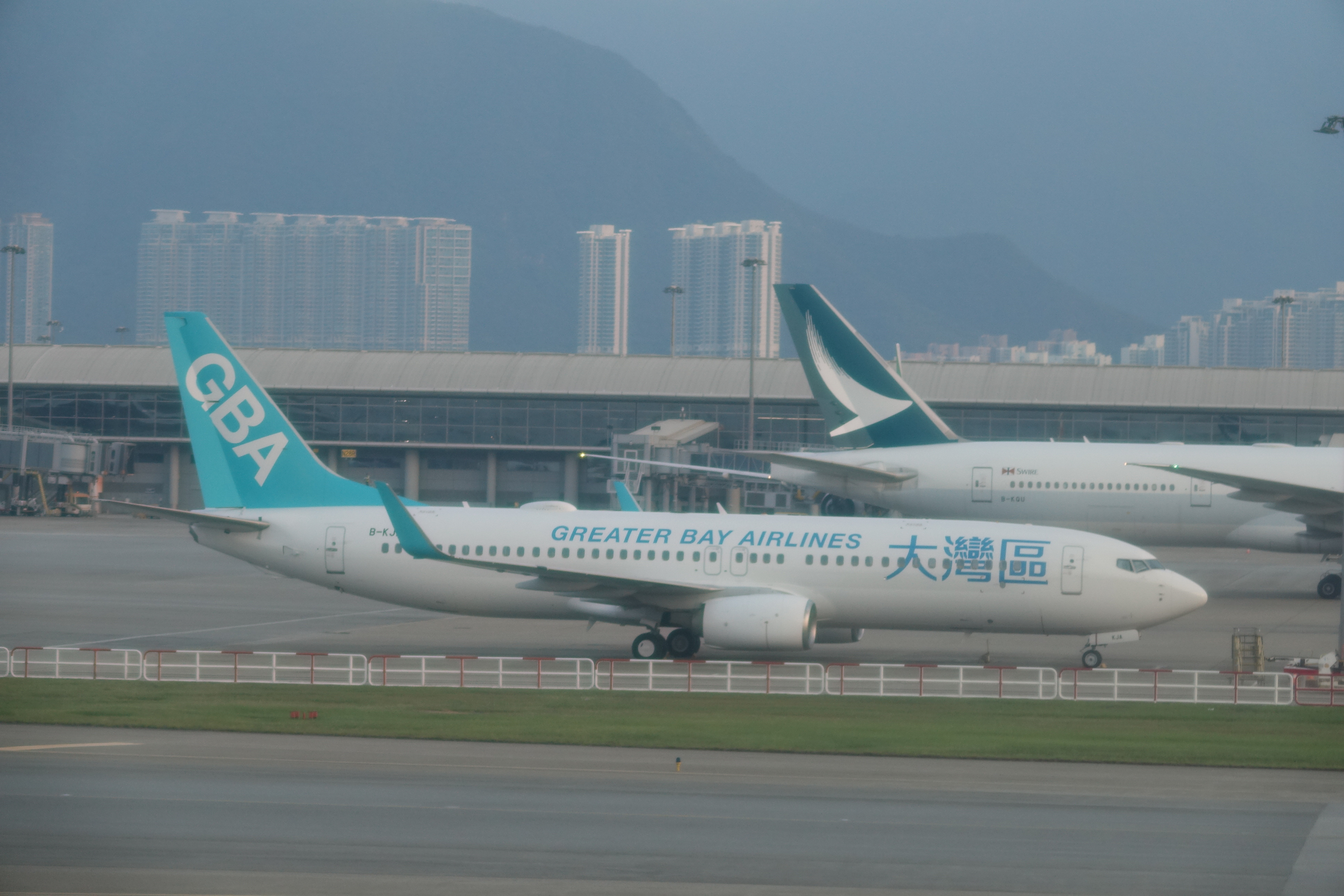 two airplanes on a runway