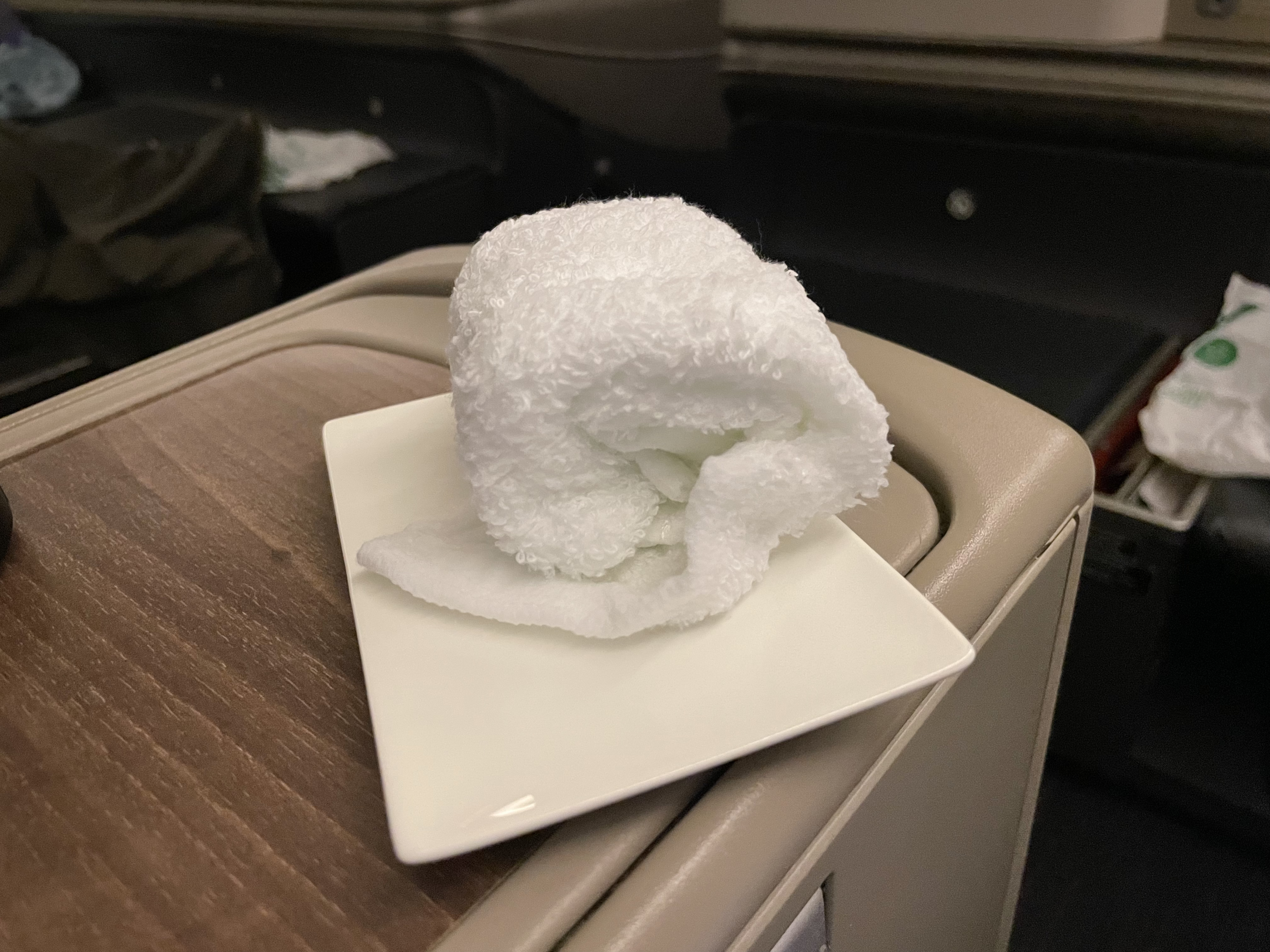 a white towel on a plate