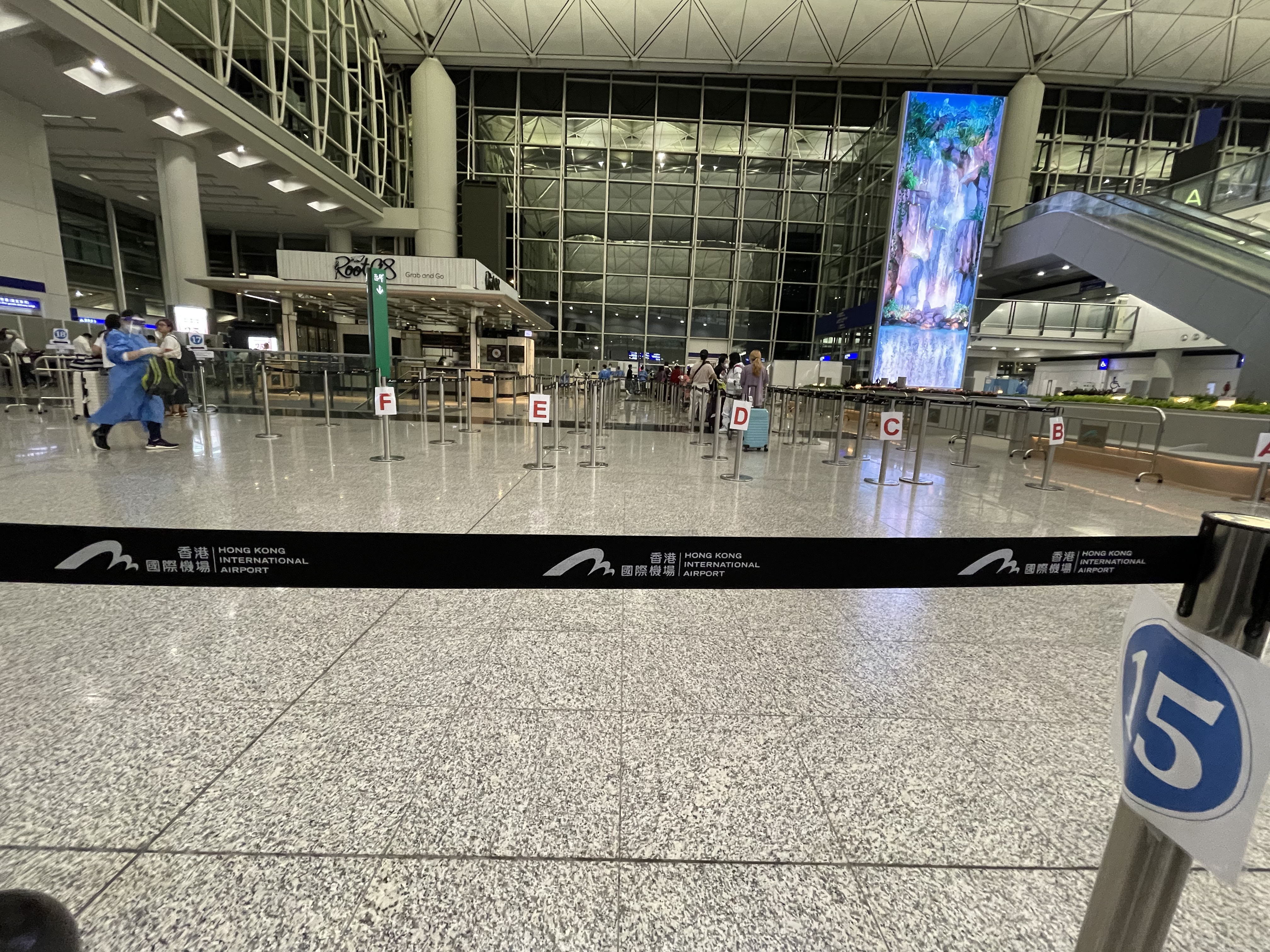 a group of people in a large airport