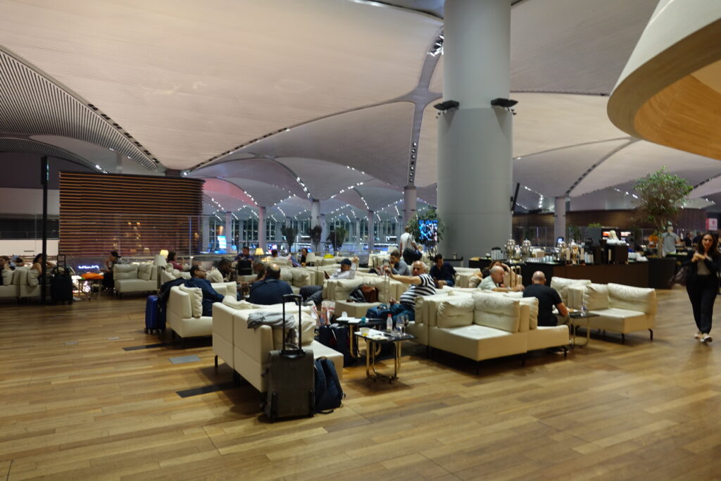 a group of people sitting in a lounge area