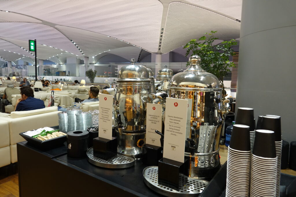 a group of silver containers on a table