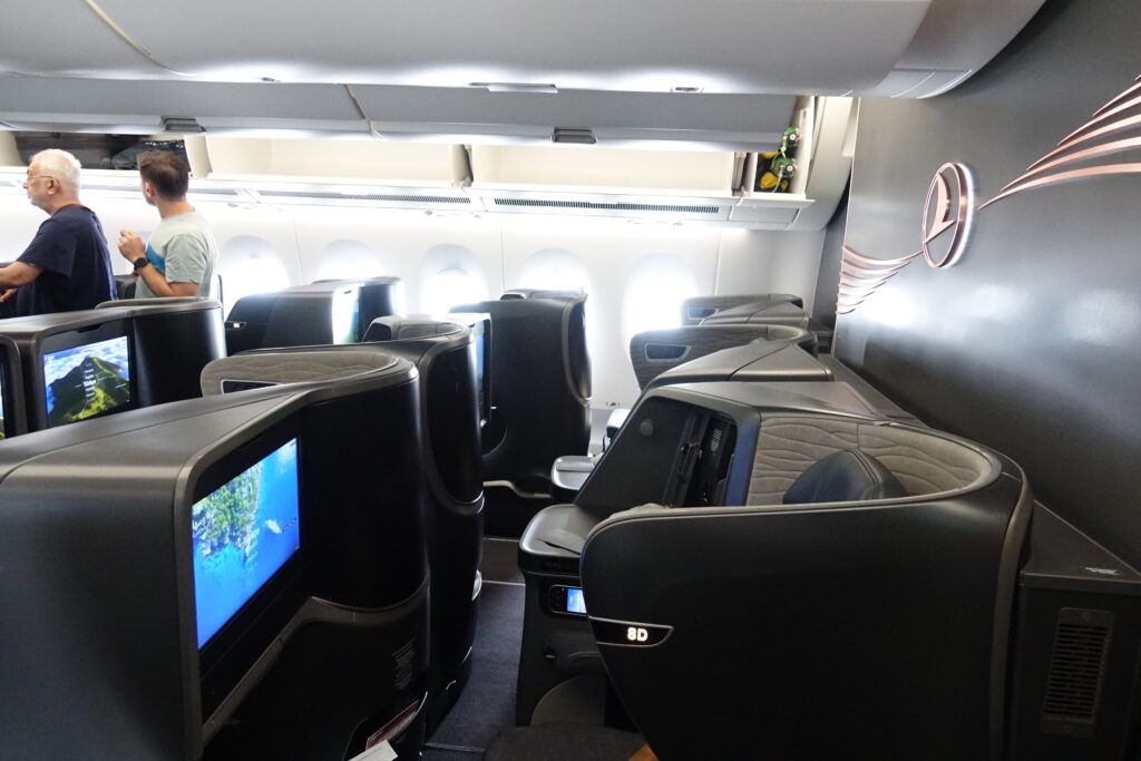 a man standing in an airplane