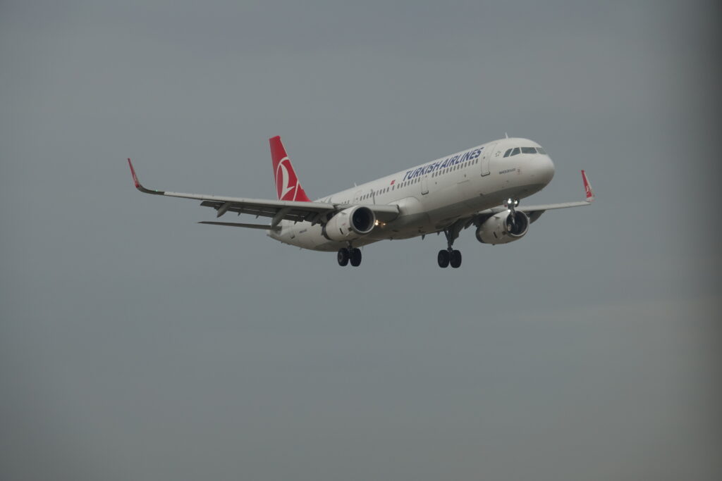 a plane flying in the sky