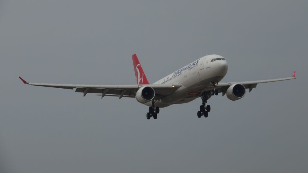 a plane flying in the sky