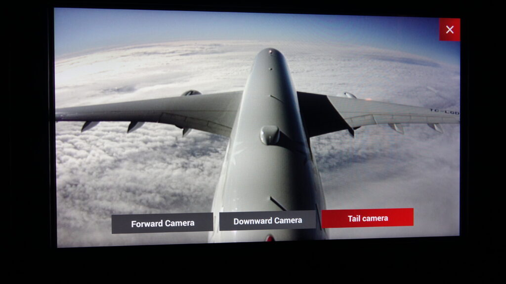 a plane flying above clouds