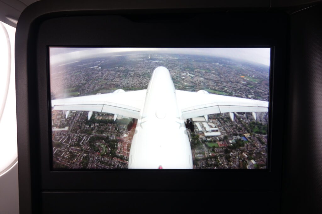 a plane flying over a city