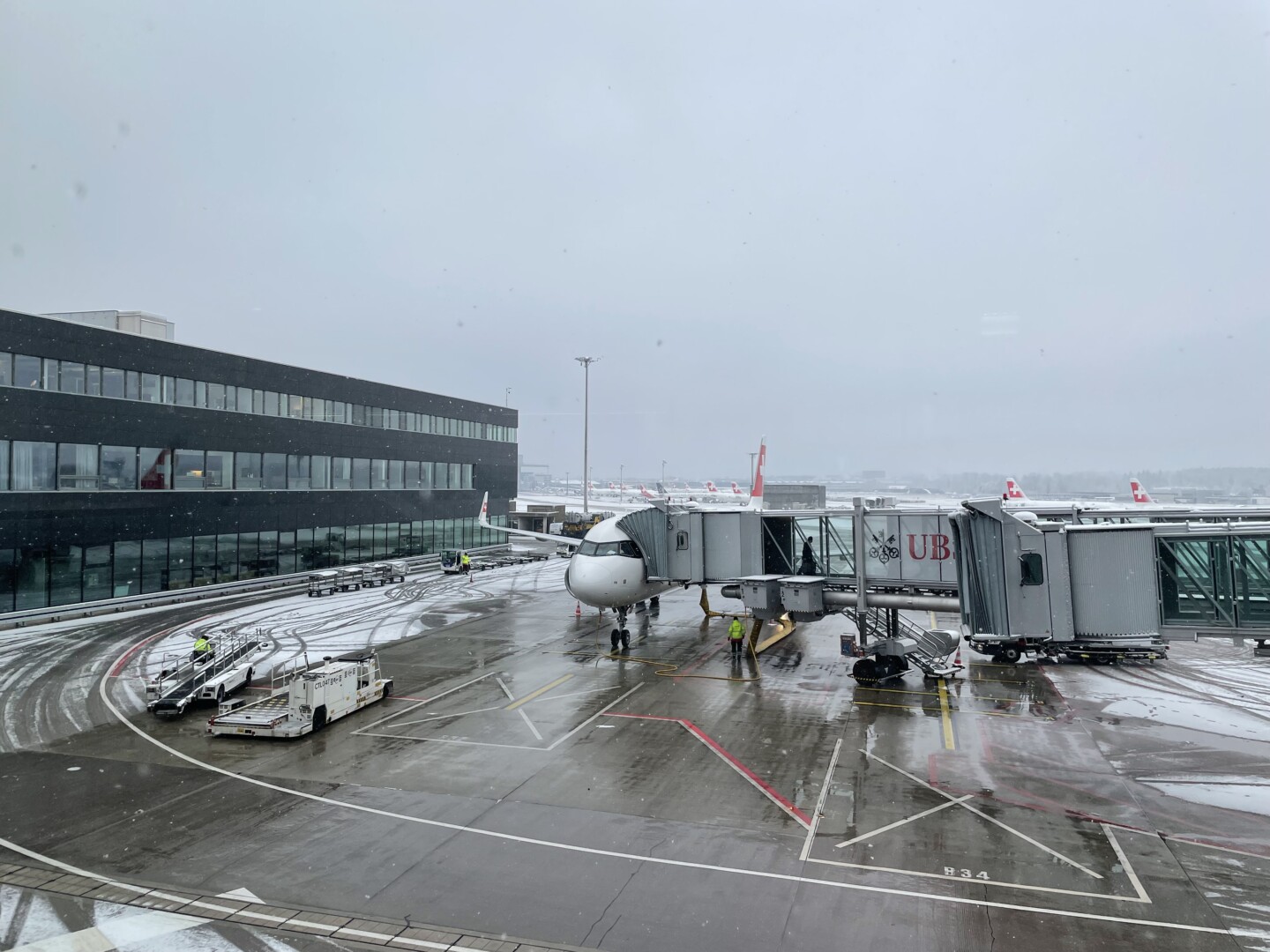 an airplane on a tarmac at an airport