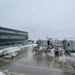 an airplane on a tarmac at an airport